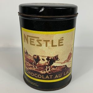 Vintage Nestle Chocolate Au Lait Cow tin. 1988, 4.25”x 6”.